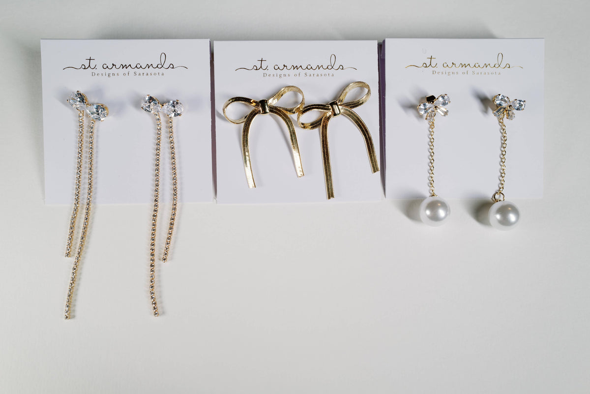 Crystal Bow and Pearl Drop Swingy Statement Earrings