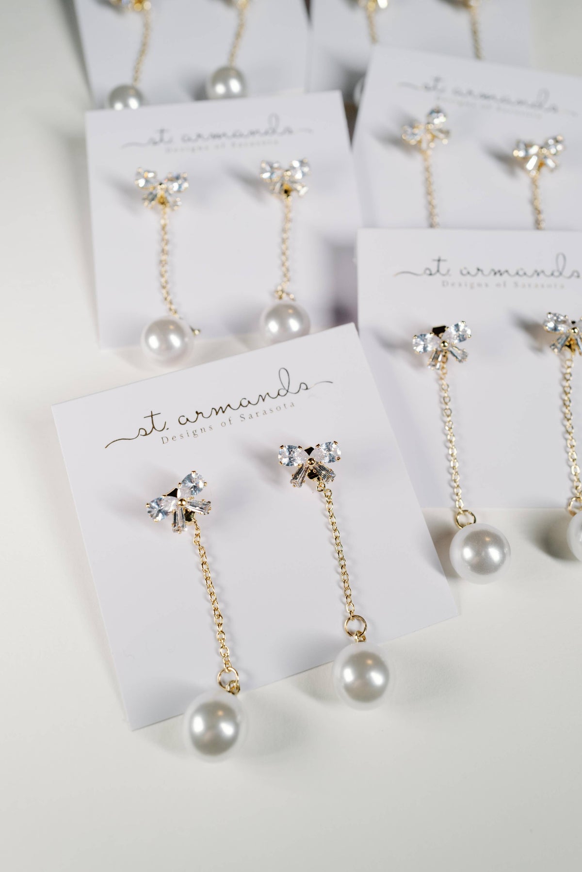 Crystal Bow and Pearl Drop Swingy Statement Earrings