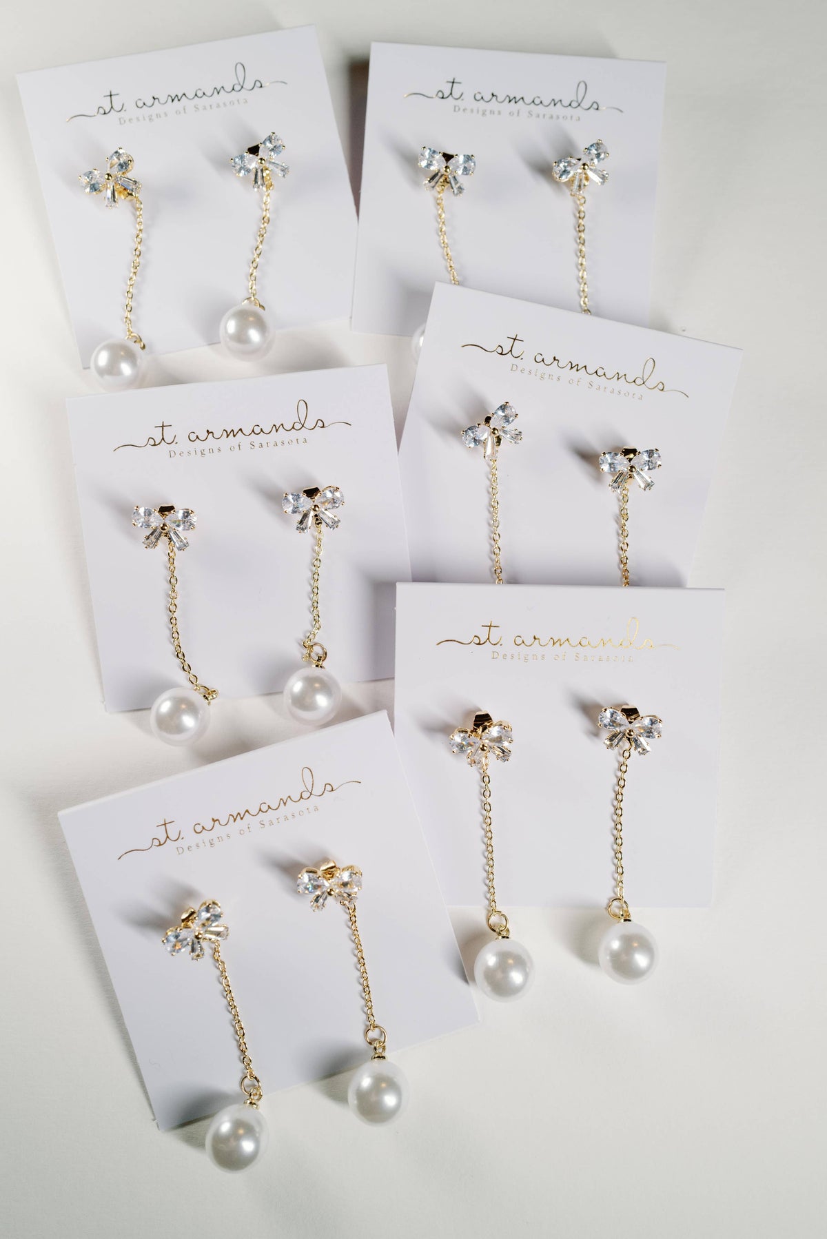 Crystal Bow and Pearl Drop Swingy Statement Earrings
